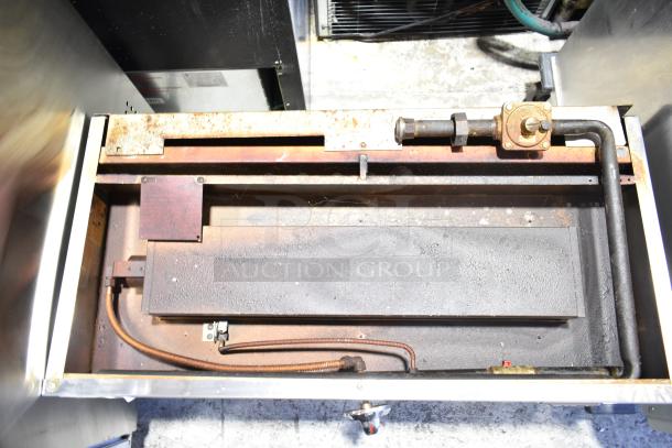 Jade JGM-36 commercial gas cheese melter, visible burner and piping, moderate wear, includes manufacturer plaque.