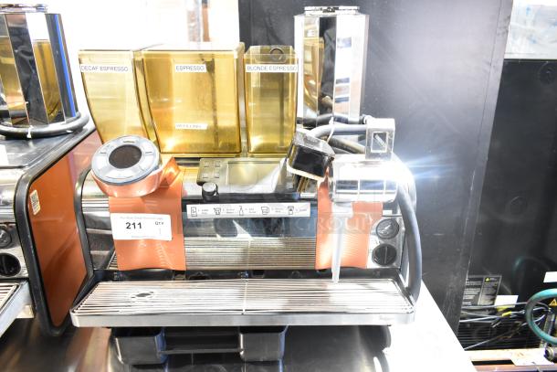 Thermoplan Mastrena II CS stainless steel commercial espresso machine with steam wand, labeled containers, 250V, 1 phase.