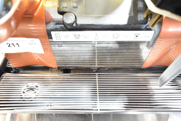 Thermoplan Mastrena II CS stainless steel automatic espresso machine with steam wand, 250V, visible use tag.