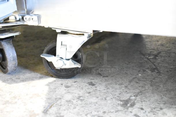 Avantco 2 Door Undercounter Cooler with durable commercial casters, 115V, 1 Phase, in excellent condition.