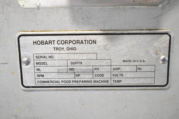 Hobart 1912 Commercial Automatic Meat Slicer, 115V, with blade sharpener. Model and serial number plate visible.
