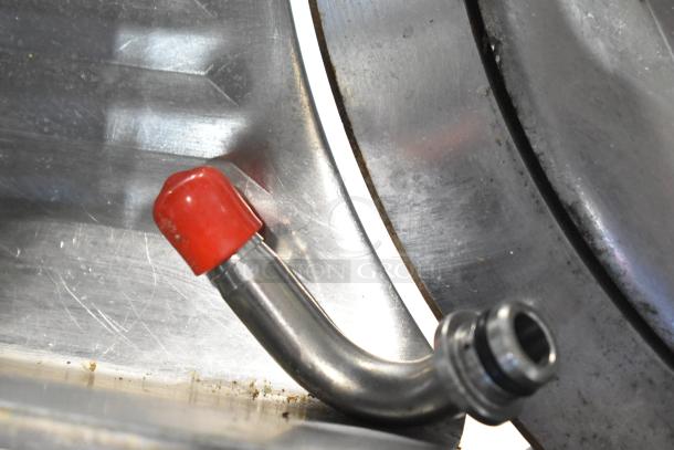 Globe Commercial Meat Slicer with automatic operation, blade sharpener, 115 volts, 1 phase. Features stainless steel finish.