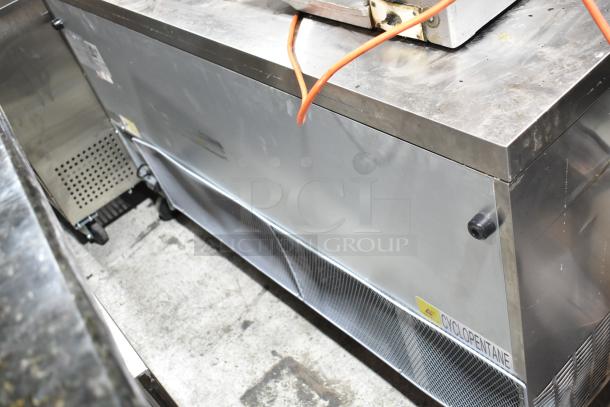 Avantco 178AU60R Commercial 2 Door Undercounter Cooler, stainless steel, on casters, 115V, visible Cyclopentane label.