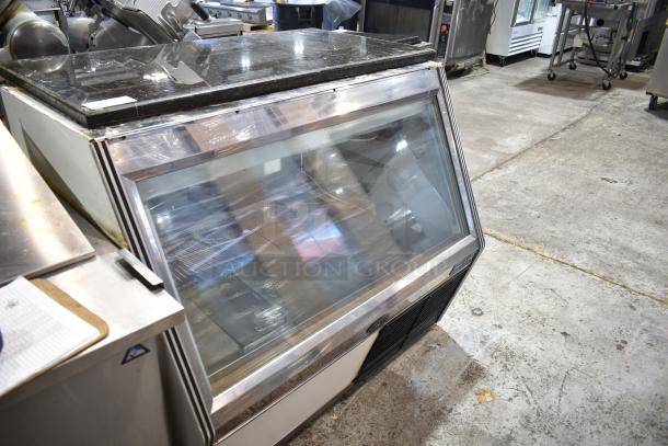 Marc Commercial Floor Style Deli Display Case, 115 Volts, 1 Phase, glass front, metal body, in used condition.