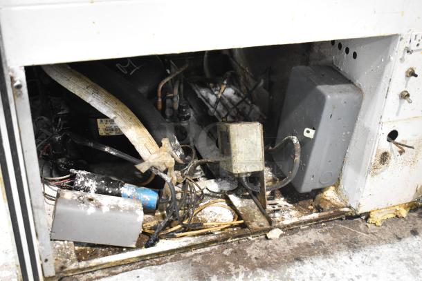 Marc Commercial Deli Display Case interior, showing wiring and components. Condition appears used, 115 volts, 1 phase.