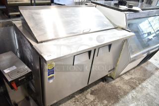 Everest EPBR2 commercial prep table, missing back of mega top. 115V, 1 phase, stainless steel, on casters, some wear.