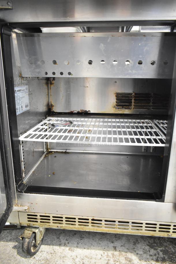 Everest EPBR2 commercial prep table on casters, interior view. Missing back of mega top. 115V, 1 phase shown on label.