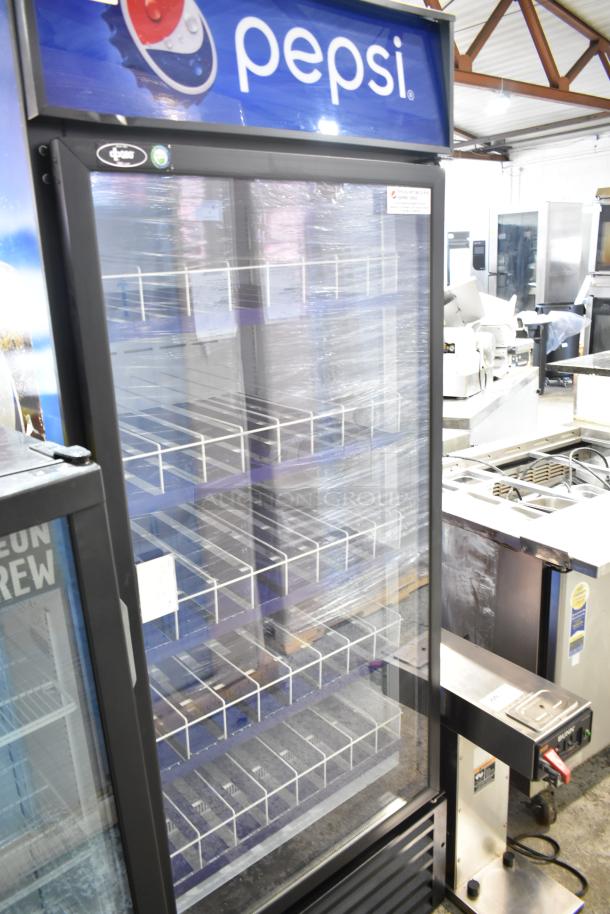QBD CD26-HC commercial single door cooler merchandiser. Features Pepsi branding, glass door, white shelves. 115V, used.