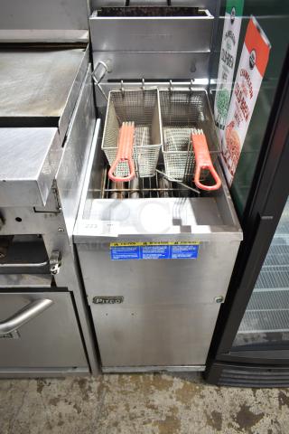 Pitco Frialator commercial gas fryer, stainless steel, with two baskets, red handles, visible caution labels, floor model.