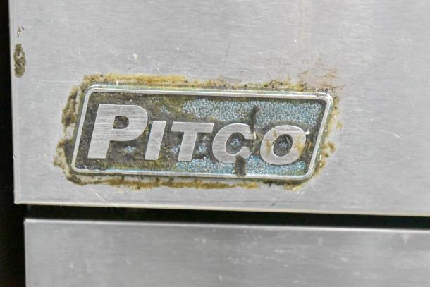 Pitco Frialator gas-powered deep fat fryer, commercial floor model, visible logo with wear and patina on metal surface.