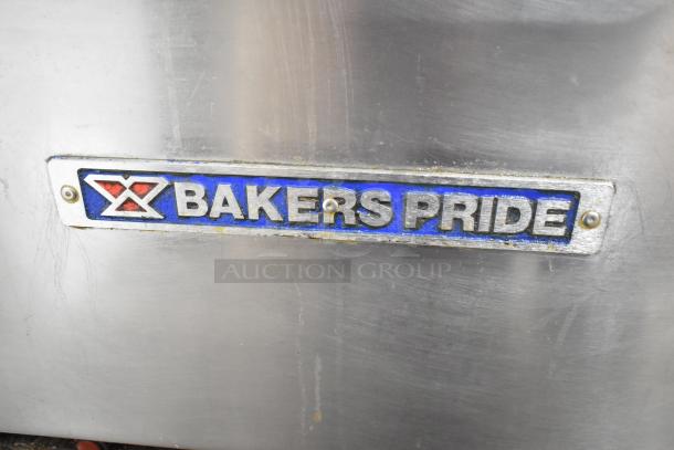 Bakers Pride logo on stainless steel surface of commercial gas range.