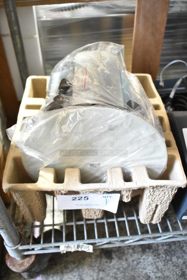 BRAND NEW SCRATCH AND DENT PS-C63RT in-ceiling speaker, white grille, in packaging, labeled "225" on cardboard base.