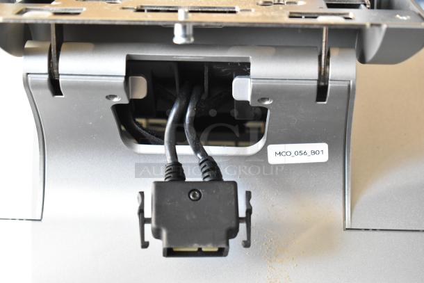 5 Micros Oracle POS docking stations, model MCO_056_B01. Features visible connectors and ID label. Good condition.