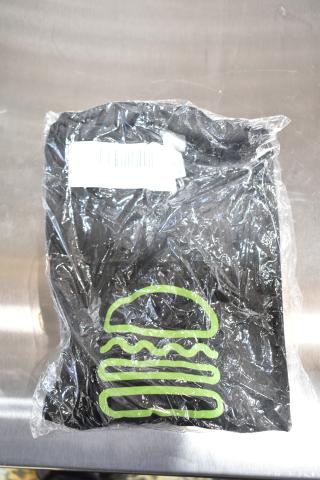 Brand new unisex Steff tee in packaging, featuring green graphic on black. Includes 2X size. Scratch and dent condition.