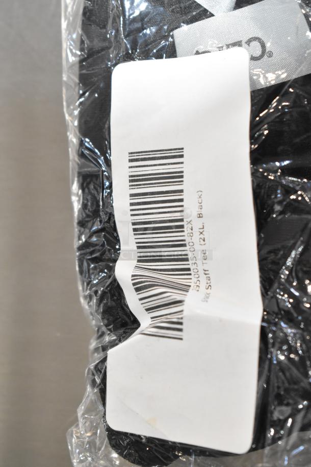 Plastic-wrapped Steff Tee, size 2XL, black. Barcode visible on label. Condition: Scratch and dent, brand new. Package of 9.