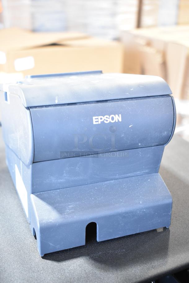 Epson M244A receipt printer, dark blue, used condition with minor scuffs, part of a lot including Oracle cash drawer and Lenovo 11UG.