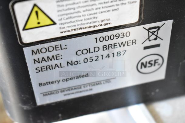 NSF-certified cold brewer label, model 1000930, serial 05214187, by Marco Beverage Systems Ltd. Battery operated.