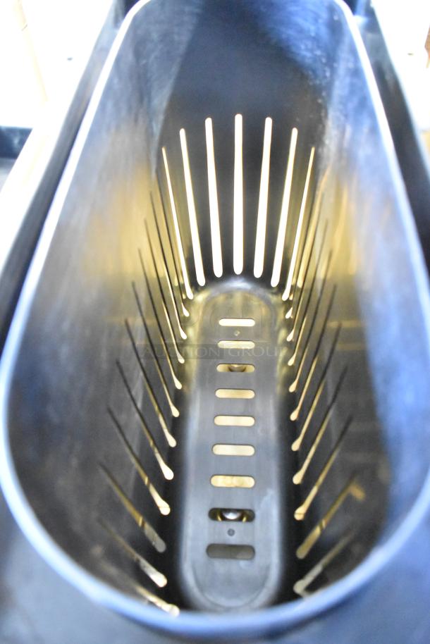 Plastic bin with slotted design, viewed from above. Provides ventilation and drainage, in good condition.