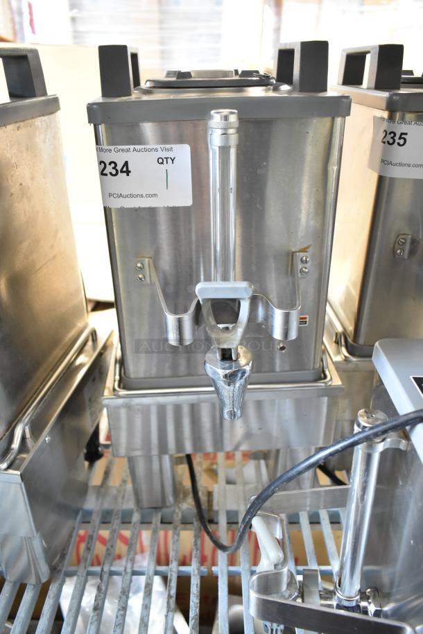 Bunn SH-S Satellite Server with stand, stainless steel, 120 volts, 1-phase. Auction tag 234 visible. Excellent condition.