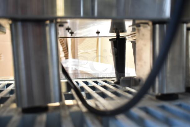 Bunn SH-S Satellite Server on stand, 120V, 1 Phase; features stainless steel legs and grid base, good condition.