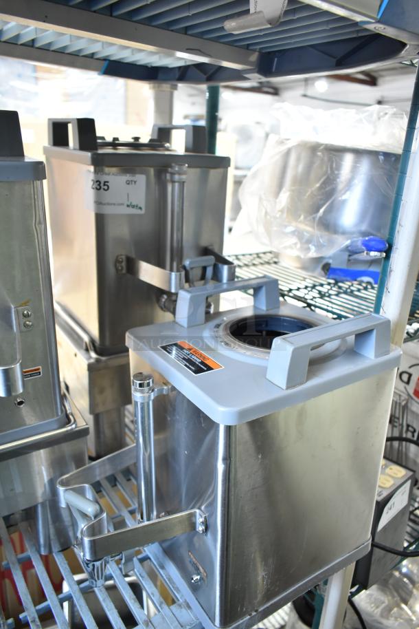 Two Bunn SH-S Satellite Servers on a server stand, 120 volts, 1 phase, with handle and spout, stainless steel body.