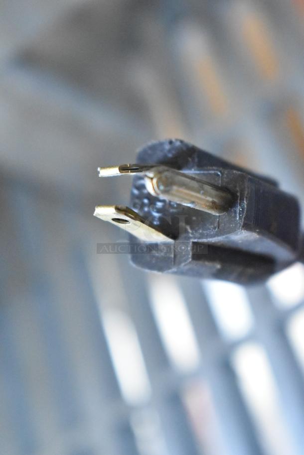 Close-up of an electrical plug for Two Bunn SH-S Server Satellite Server. Power specs: 120 Volts, 1 Phase.