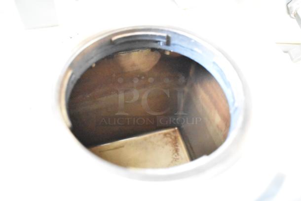 Inside view of a Bunn SH-S Server Satellite Server. Stainless steel interior shows signs of use. 120V, 1 Phase.