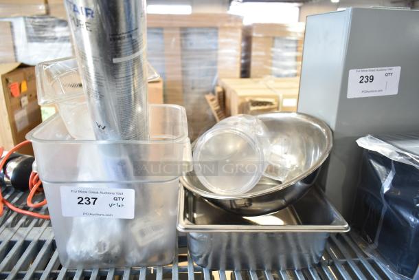 Lot of various kitchen items including a metal bowl, drop-in bins, poly bin. Tags show lot numbers 237 and 239.
