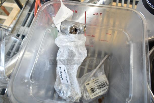 Assorted items lot with bowl, drop-in bins, and poly bin. Includes wrapped item labeled "G67628, Z6340600-PC ASSEMBLY".