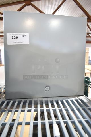 Dayton A16N16ALP gray enclosure, in good condition, with a front latch and auction tag 239, shown on a metal shelf.