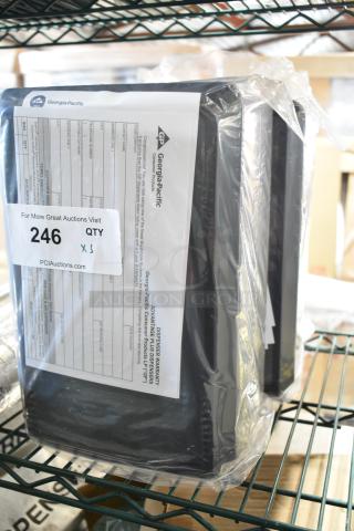 Three brand new Georgia Pacific dispensers in original packaging, SKU 246, with warranty details visible.
