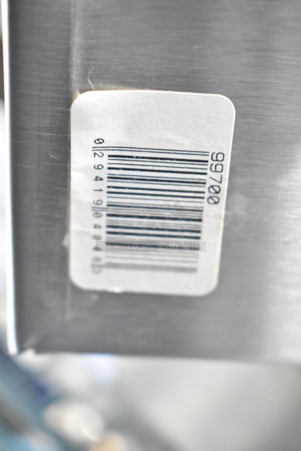 Silverware caddy with barcode label, stainless steel finish, shows slight wear. Model number: 99700. Set of 2.