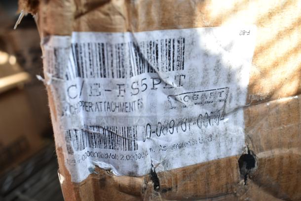 Damaged box labeled "C/E-FS5PT" for Hobart 22C/E-FS5PLT meat chopper attachment. Includes knife and 5 plates. Scratch and dent condition.