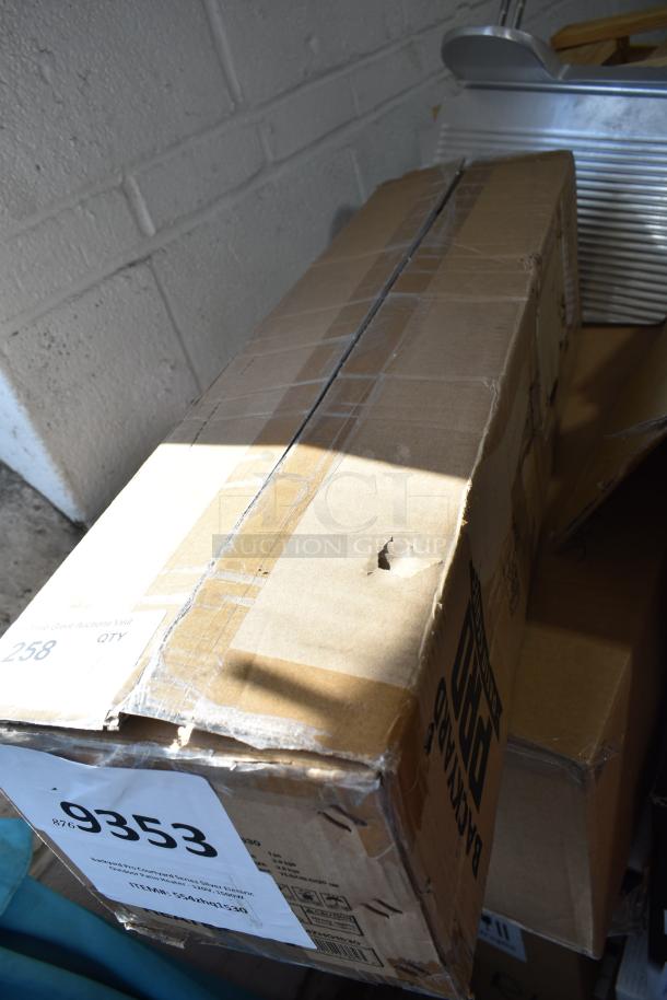Box containing a Backyard Pro 554zhq1530 Courtyard Series silver electric patio heater, showing minor packaging dents.