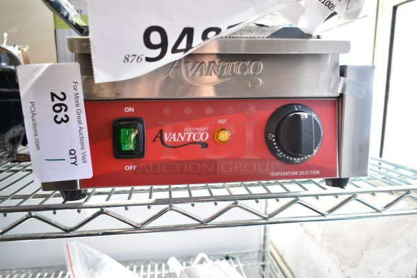 Brand new Avantco 177PG100S Panini Sandwich Grill with smooth plates, 8.5" x 8.5" surface, and temperature control.