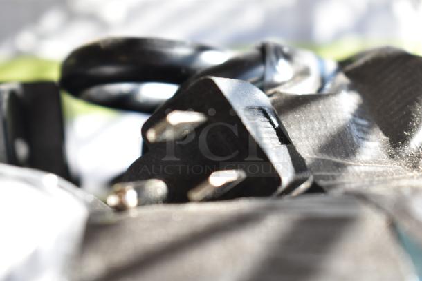 Alt text: Avantco 177PG100S Panini Grill power cord, focusing on the plug, brand new with slight cosmetic scratches.