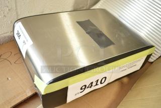 BRAND NEW! Tork 712465500 Stainless Steel Double Jumbo Roll Toilet Paper Dispenser, scratch and dent condition.