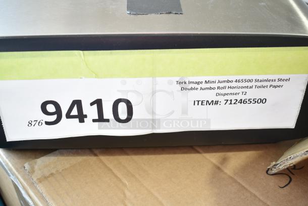 Stainless steel Tork 712465500 Image Mini Jumbo Double Roll Toilet Paper Dispenser, new with minor scratches, item #712465500.