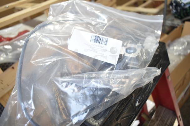 Box of various items, including Berkel blade, point switch, ignition control, in scratch and dent condition. Barcoded bag labeled HP169852.