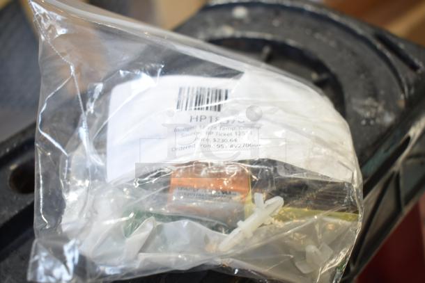 Box of assorted items including Berkel blade; new with scratches; features temperature control and ignition switch; labeled HP15370.