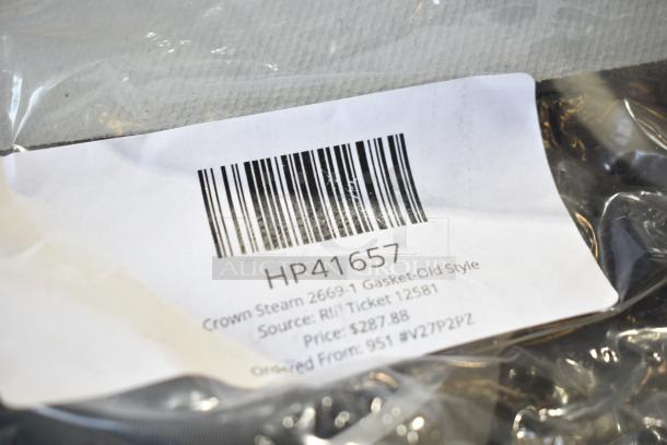 Box of various brand new items in sealed bag with visible label. Label shows SKU HP41657, Crown Steam 2669-1 Gasket-Old Style, priced at $287.88.
