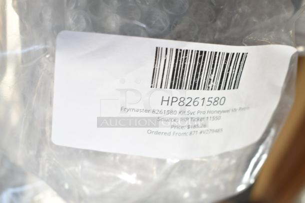 Box label showing Frymaster 8261580 Kit, price $185.26, includes barcode and order details.