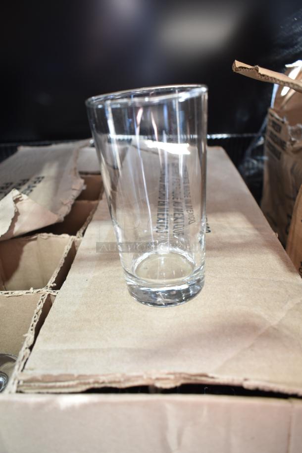 Brand new Libbey 126 Heavy Base 11 oz. Customizable Collins/Mojito Glass on cardboard, with visible packaging text.