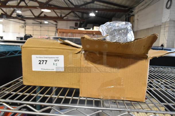 Box containing two BCR-5 Bell Creamers, labeled "Qty 2," in new scratch and dent condition, placed on a metal shelf.