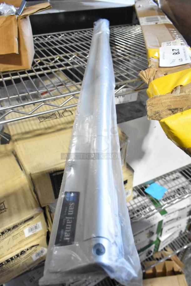 San Jamar CK6544A 44" x 2" aluminum ticket holder, new scratch and dent, wall-mounted, 2 included, in packaging.