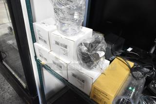 8 new scratch and dent items including Jam Jars, Reusable Craft Cups, in original packaging with visible barcodes.