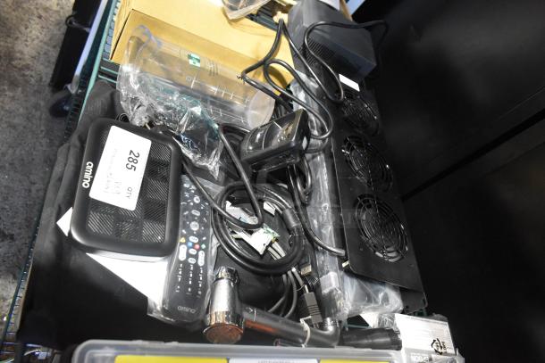 Auction lot with power conditioner, Amino box, remote, and Symbol barcode scanner. Includes cables and accessories. Multiple quantities.