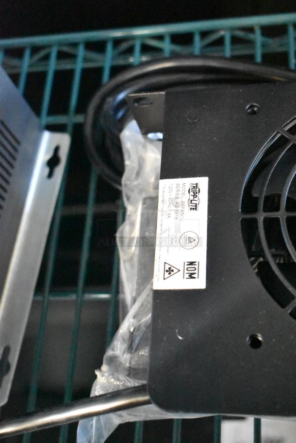 Tripp Lite power conditioner with visible label on metal rack; part of a lot including Amino, remote, and Symbol barcode scanner.