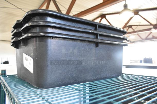 Three stacked black poly bus bins on a wire shelf, labeled "290 QTY 3", indicating auction set. Durable and ideal for efficiency.