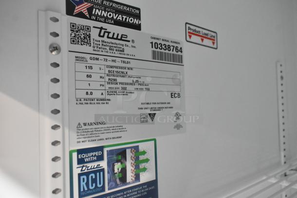 2022 True GDM-72-HC commercial cooler label, 115V, 1 phase, R290 refrigerant, model and compressor details visible.